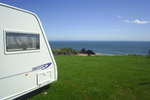 Caravan pitches overlooking Three Cliffs Bay