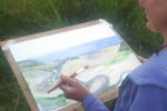 Working on a painting of Three Cliffs